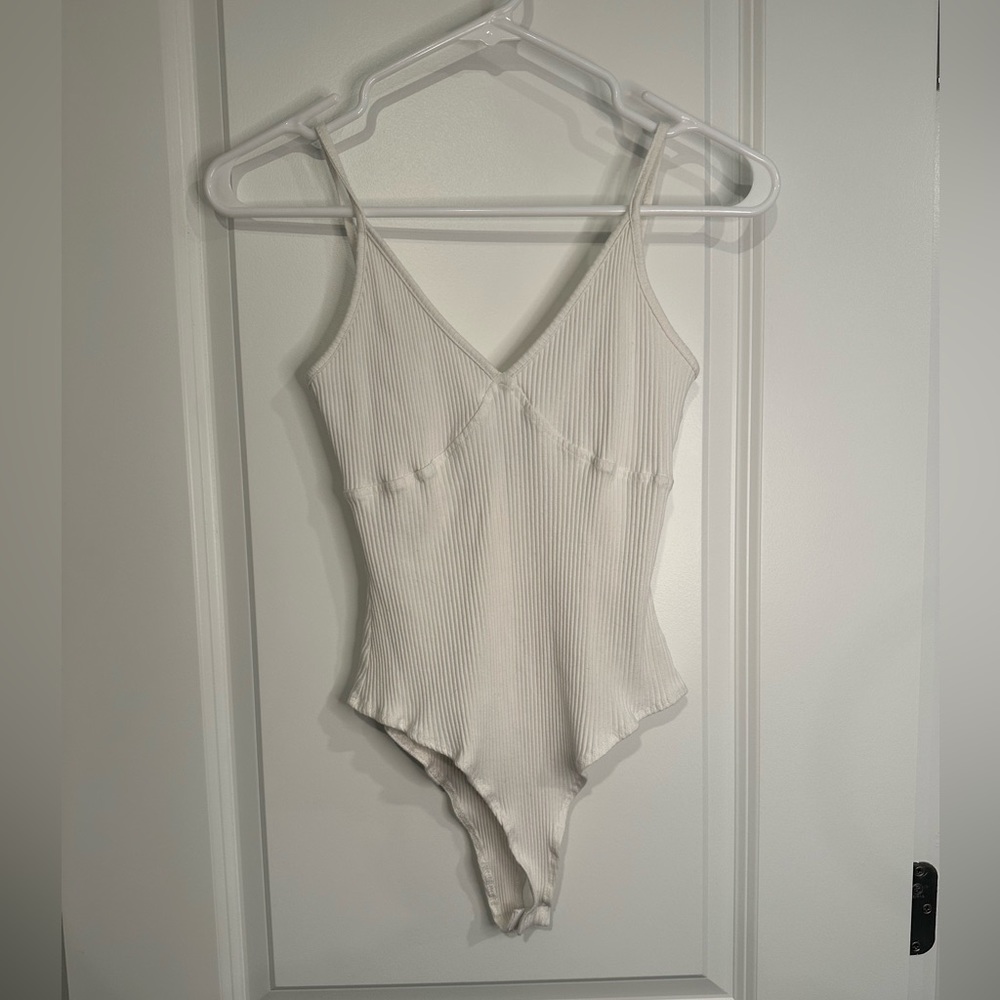 Polly body-con adjustable straps bodysuit.